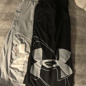 Under Armour basketball shorts 2 pairs 1 black & 1 light gray. Never worn! YM